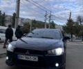Черный Мицубиси Лансер, объемом двигателя 2 л и пробегом 222 тыс. км за 6000 $, фото 10 на Automoto.ua