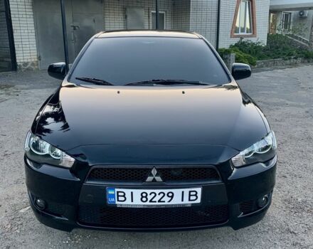 Чорний Міцубісі Lancer, об'ємом двигуна 2 л та пробігом 195 тис. км за 7000 $, фото 6 на Automoto.ua