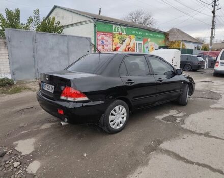 Черный Мицубиси Лансер, объемом двигателя 1.6 л и пробегом 270 тыс. км за 3800 $, фото 3 на Automoto.ua