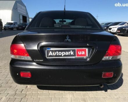 Черный Мицубиси Лансер, объемом двигателя 1.6 л и пробегом 356 тыс. км за 4590 $, фото 11 на Automoto.ua