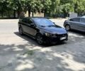 Черный Мицубиси Лансер, объемом двигателя 2 л и пробегом 240 тыс. км за 5928 $, фото 1 на Automoto.ua