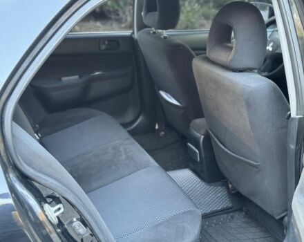 Чорний Міцубісі Lancer, об'ємом двигуна 1.6 л та пробігом 300 тис. км за 4600 $, фото 16 на Automoto.ua