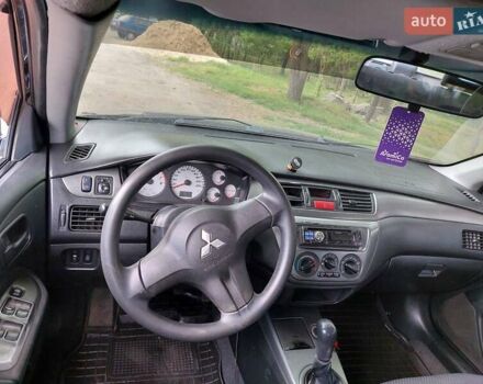 Чорний Міцубісі Lancer, об'ємом двигуна 1.6 л та пробігом 215 тис. км за 4900 $, фото 13 на Automoto.ua