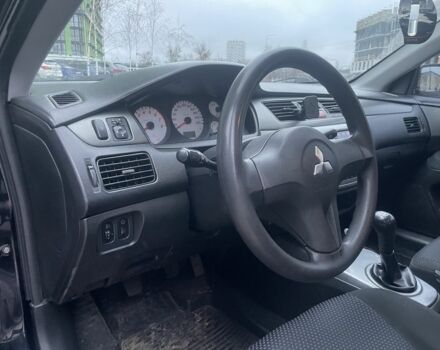 Черный Мицубиси Лансер, объемом двигателя 1.6 л и пробегом 226 тыс. км за 3750 $, фото 8 на Automoto.ua