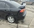 Чорний Міцубісі Lancer, об'ємом двигуна 0 л та пробігом 276 тис. км за 5750 $, фото 6 на Automoto.ua