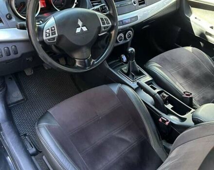 Черный Мицубиси Лансер, объемом двигателя 2 л и пробегом 230 тыс. км за 7000 $, фото 9 на Automoto.ua