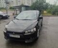 Черный Мицубиси Лансер, объемом двигателя 2 л и пробегом 228 тыс. км за 7300 $, фото 1 на Automoto.ua
