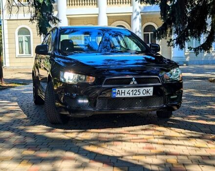 Черный Мицубиси Лансер, объемом двигателя 1.5 л и пробегом 235 тыс. км за 5250 $, фото 1 на Automoto.ua