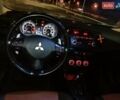 Черный Мицубиси Лансер, объемом двигателя 2 л и пробегом 240 тыс. км за 6400 $, фото 15 на Automoto.ua