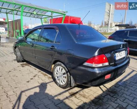 Чорний Міцубісі Lancer, об'ємом двигуна 1.6 л та пробігом 335 тис. км за 3100 $, фото 4 на Automoto.ua