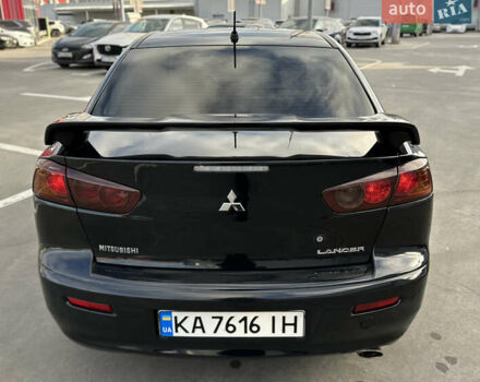 Чорний Міцубісі Lancer, об'ємом двигуна 2 л та пробігом 290 тис. км за 5900 $, фото 13 на Automoto.ua