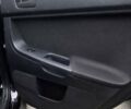 Чорний Міцубісі Lancer, об'ємом двигуна 2 л та пробігом 235 тис. км за 6500 $, фото 28 на Automoto.ua