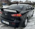 Черный Мицубиси Лансер, объемом двигателя 2 л и пробегом 280 тыс. км за 6800 $, фото 3 на Automoto.ua