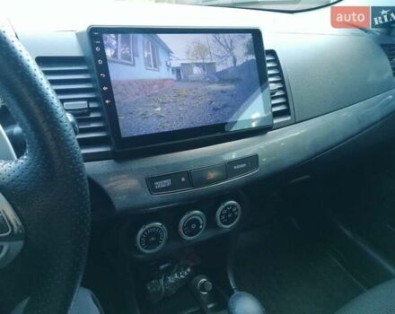 Мицубиси Лансер 2008 в Киеве на Automoto.ua Черный Мицубиси Лансер, объемом двигателя 2 л и пробегом 196 тыс. км за 5500 $, фото 36 на Automoto.ua