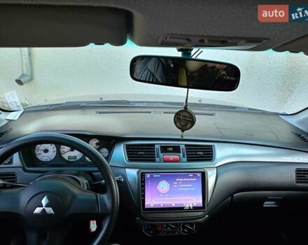 Мицубиси Лансер 2008 в Львове на Automoto.ua Черный Мицубиси Лансер, объемом двигателя 1.58 л и пробегом 200 тыс. км за 5200 $, фото 97 на Automoto.ua