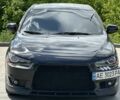 Черный Мицубиси Лансер, объемом двигателя 2 л и пробегом 230 тыс. км за 6999 $, фото 1 на Automoto.ua
