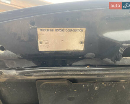 Черный Мицубиси Лансер, объемом двигателя 1.58 л и пробегом 211 тыс. км за 6333 $, фото 36 на Automoto.ua
