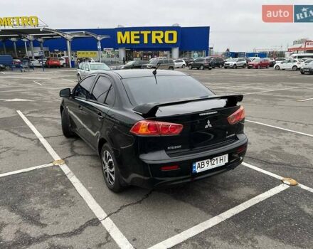 Черный Мицубиси Лансер, объемом двигателя 1.5 л и пробегом 225 тыс. км за 5100 $, фото 12 на Automoto.ua