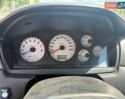 Чорний Міцубісі Lancer, об'ємом двигуна 1.6 л та пробігом 292 тис. км за 3600 $, фото 21 на Automoto.ua