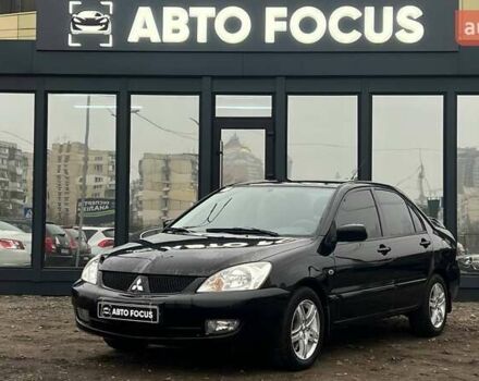 Чорний Міцубісі Lancer, об'ємом двигуна 1.6 л та пробігом 340 тис. км за 6190 $, фото 3 на Automoto.ua