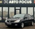 Чорний Міцубісі Lancer, об'ємом двигуна 1.6 л та пробігом 340 тис. км за 6190 $, фото 3 на Automoto.ua