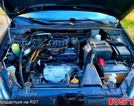 Чорний Міцубісі Lancer, об'ємом двигуна 1.6 л та пробігом 219 тис. км за 4800 $, фото 9 на Automoto.ua