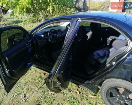 Мицубиси Лансер 2008 в Киеве на Automoto.ua Черный Мицубиси Лансер, объемом двигателя 2 л и пробегом 196 тыс. км за 5500 $, фото 9 на Automoto.ua