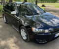 Чорний Міцубісі Lancer, об'ємом двигуна 2 л та пробігом 292 тис. км за 6650 $, фото 2 на Automoto.ua