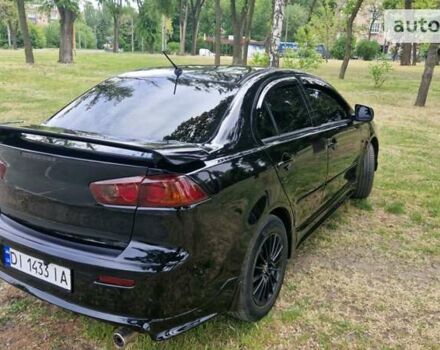 Чорний Міцубісі Lancer, об'ємом двигуна 2 л та пробігом 190 тис. км за 8000 $, фото 14 на Automoto.ua