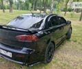 Чорний Міцубісі Lancer, об'ємом двигуна 2 л та пробігом 190 тис. км за 8000 $, фото 14 на Automoto.ua