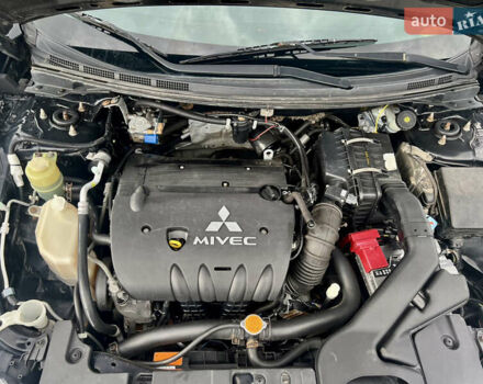 Мицубиси Лансер 2008 в Киеве на Automoto.ua Черный Мицубиси Лансер, объемом двигателя 2 л и пробегом 219 тыс. км за 6500 $, фото 13 на Automoto.ua