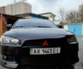 Чорний Міцубісі Lancer, об'ємом двигуна 2 л та пробігом 98 тис. км за 8000 $, фото 1 на Automoto.ua