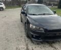 Черный Мицубиси Лансер, объемом двигателя 2 л и пробегом 230 тыс. км за 6011 $, фото 1 на Automoto.ua