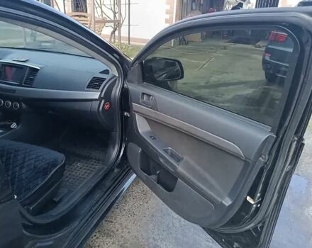 Мицубиси Лансер 2008 в Львове на Automoto.ua Черный Мицубиси Лансер, объемом двигателя 2 л и пробегом 210 тыс. км за 6500 $, фото 9 на Automoto.ua