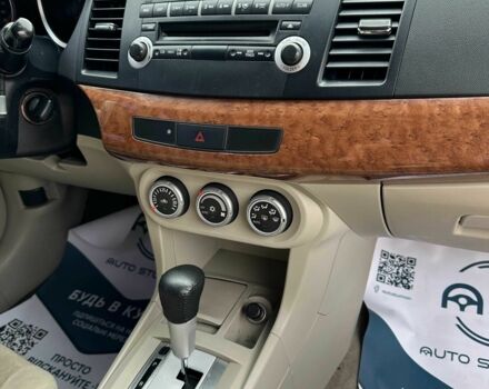 Чорний Міцубісі Lancer, об'ємом двигуна 2 л та пробігом 239 тис. км за 6900 $, фото 10 на Automoto.ua