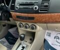 Чорний Міцубісі Lancer, об'ємом двигуна 2 л та пробігом 239 тис. км за 6900 $, фото 10 на Automoto.ua