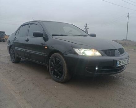 Чорний Міцубісі Lancer, об'ємом двигуна 1.58 л та пробігом 233 тис. км за 4800 $, фото 8 на Automoto.ua