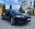 Черный Мицубиси Лансер, объемом двигателя 2 л и пробегом 270 тыс. км за 5200 $, фото 2 на Automoto.ua