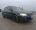 Чорний Міцубісі Lancer, об'ємом двигуна 1.58 л та пробігом 233 тис. км за 4800 $, фото 8 на Automoto.ua