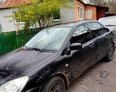 Чорний Міцубісі Lancer, об'ємом двигуна 1.6 л та пробігом 126 тис. км за 4500 $, фото 2 на Automoto.ua