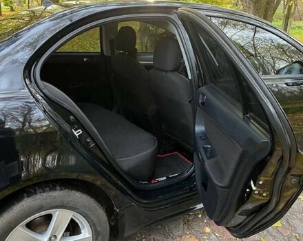 Чорний Міцубісі Lancer, об'ємом двигуна 2 л та пробігом 237 тис. км за 7500 $, фото 22 на Automoto.ua