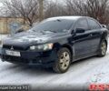 Чорний Міцубісі Lancer, об'ємом двигуна 2 л та пробігом 246 тис. км за 6200 $, фото 1 на Automoto.ua