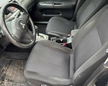 Чорний Міцубісі Lancer, об'ємом двигуна 1.6 л та пробігом 245 тис. км за 4500 $, фото 14 на Automoto.ua