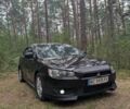 Чорний Міцубісі Lancer, об'ємом двигуна 2 л та пробігом 196 тис. км за 4603 $, фото 1 на Automoto.ua