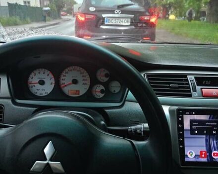 Мицубиси Лансер 2008 в Львове на Automoto.ua Черный Мицубиси Лансер, объемом двигателя 1.58 л и пробегом 200 тыс. км за 5200 $, фото 40 на Automoto.ua