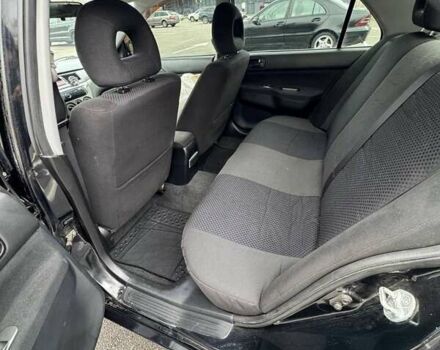 Чорний Міцубісі Lancer, об'ємом двигуна 1.6 л та пробігом 245 тис. км за 4500 $, фото 16 на Automoto.ua