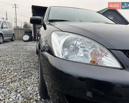 Черный Мицубиси Лансер, объемом двигателя 1.58 л и пробегом 202 тыс. км за 4100 $, фото 20 на Automoto.ua