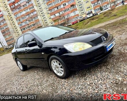 Черный Мицубиси Лансер, объемом двигателя 1.6 л и пробегом 216 тыс. км за 5190 $, фото 6 на Automoto.ua