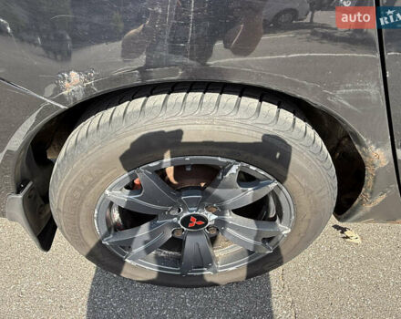 Черный Мицубиси Лансер, объемом двигателя 1.6 л и пробегом 321 тыс. км за 5000 $, фото 12 на Automoto.ua