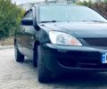 Чорний Міцубісі Lancer, об'ємом двигуна 16 л та пробігом 250 тис. км за 4500 $, фото 1 на Automoto.ua